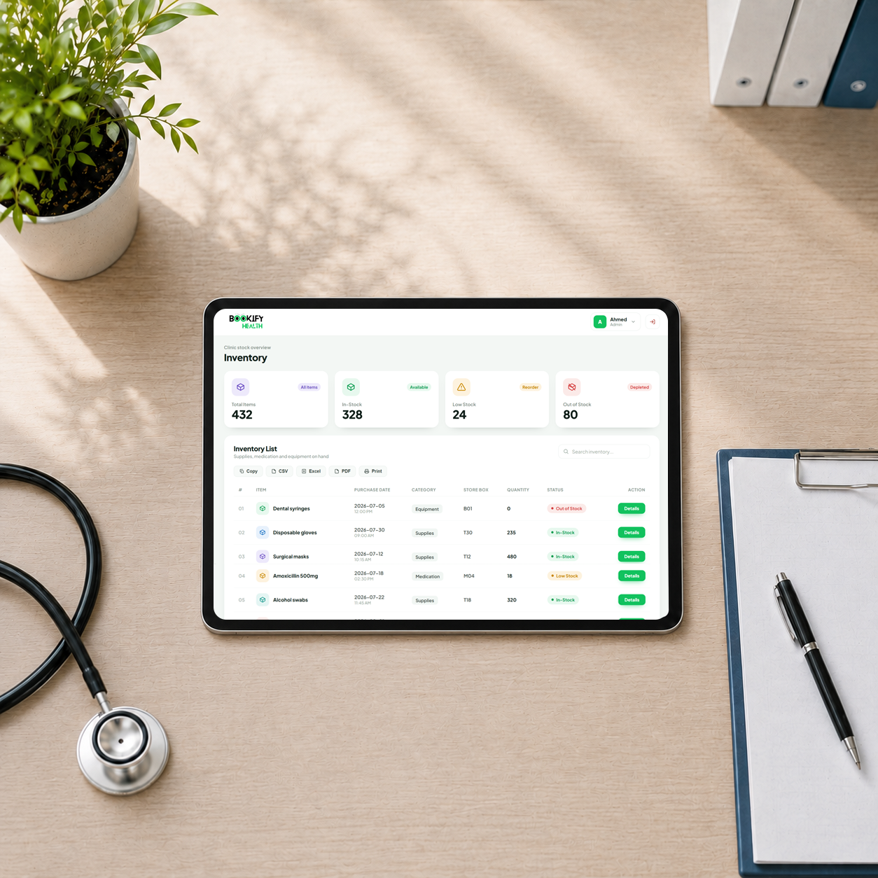 A tablet on a desk showing the Bookify Health inventory dashboard
